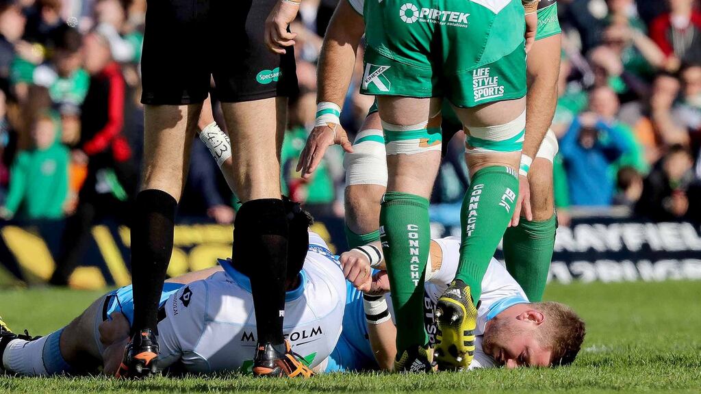 Glasgow’s Finn Russell goes down injured at the Sportsground.