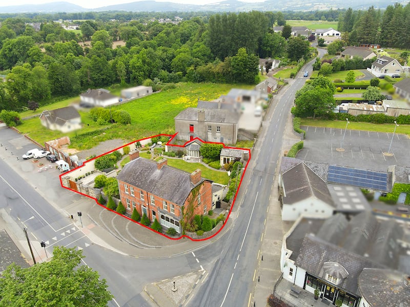 The property lies on a prominent site in the village