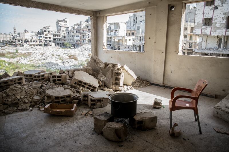 A cooking pot inside a destroyed school in Homs. Photograph: Sally Hayden
