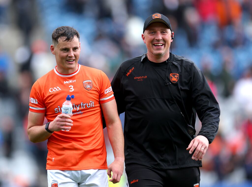 Kieran Donaghy (right) works with with the Armagh team that will take on Kerry in Croke Park this weekend. Photograph: James Crombie/Inpho