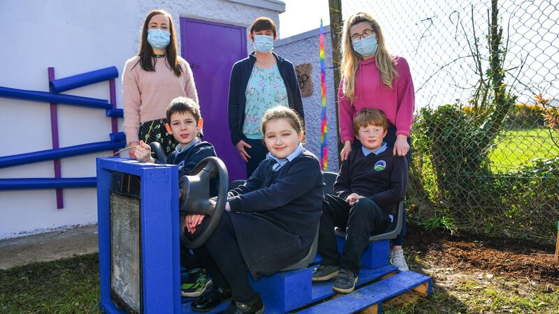 Sonas class students (from left) Alex O’Shea, Willow Spratt and Aaron Frewen along with (from left) class teacher Maria Murphy and SNAs Joan O’Connor and Ashley Ryan, in the new sensory garden at Anglesboro NS.