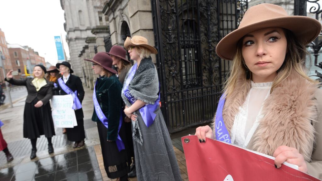 Katie Donoghue, from Drumcondra in Dublin, joined other Suffragettes outside Leinster House on Tuesday, a century after women won the right to vote, to show support for a new generation fighting for abortion rights ahead of the referendum. Photograph: Dara Mac Dónaill