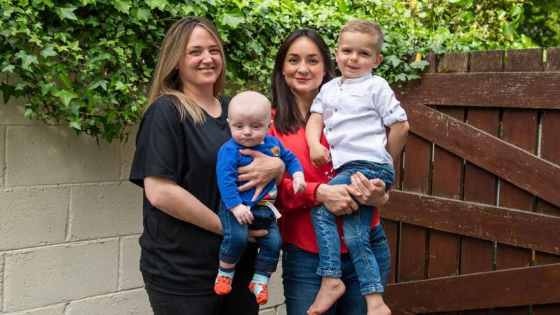 Etain Kidney (left), her wife Michelle Walls and their sons, Bobby and Tadhg. Photograph: Ruth Medjber