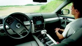 Auto industry ponders robot-car liability