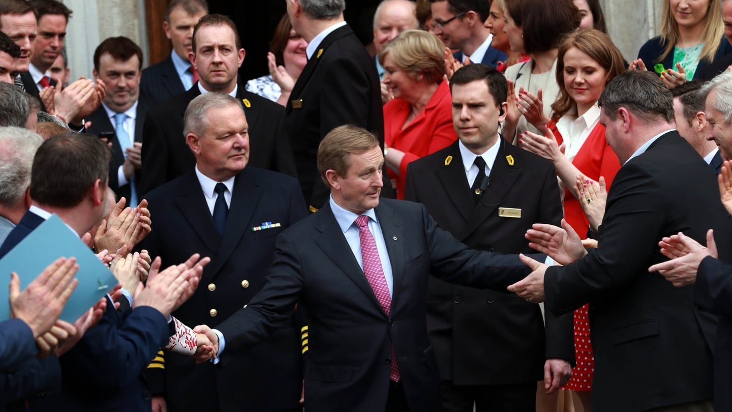 Newly elected Taoiseach  Enda Kenny is  congratulated as he leaves the Dail after becoming the first Fine Gael leader to be re-elected as Taoiseach. Photograph: The Irish Times