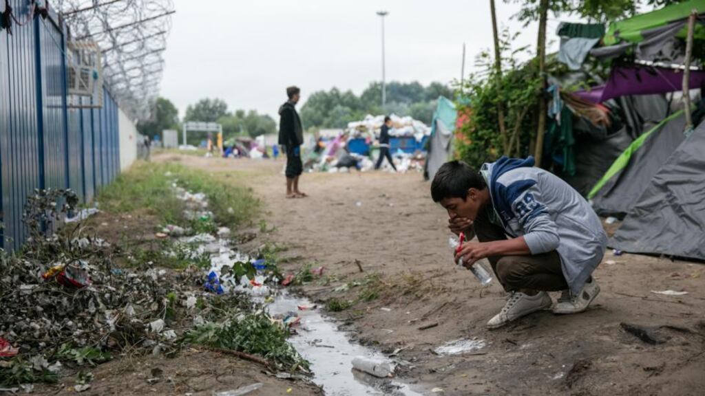 An informal camp in Serbia beside the border fence close to the E75 Horgas border crossing with Hungary. Photograph: Matt Cardy/Getty Images