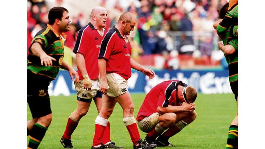 Munster players, left to right in red, Keith Wood, Peter Clohessy and Jon Langford show their disappointment as Northampton and Argentina prop Federico Mendez, extreme left, celebrates victory after the 2000 European Cup final at Twickenham. - (Photograph: Eric Luke)