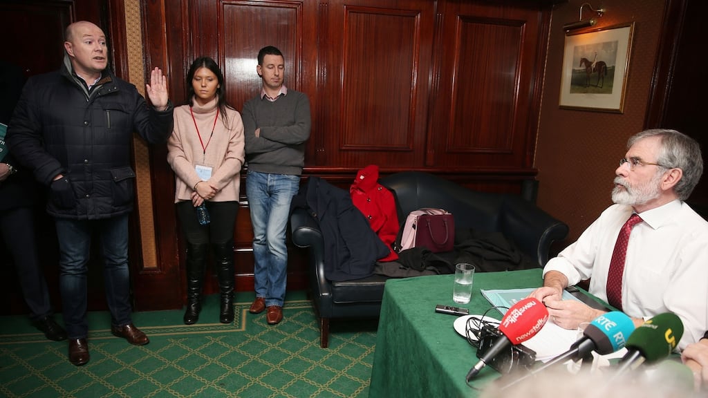 Austin Stack (left), son of Brian Stack, a prison officer murdered in 1983, confronts Sinn Féin leader Gerry Adams (right) during a Sinn Féin press conference at the Davenport Hotel in Dublin. Photograph: Brian Lawless/PA Wire