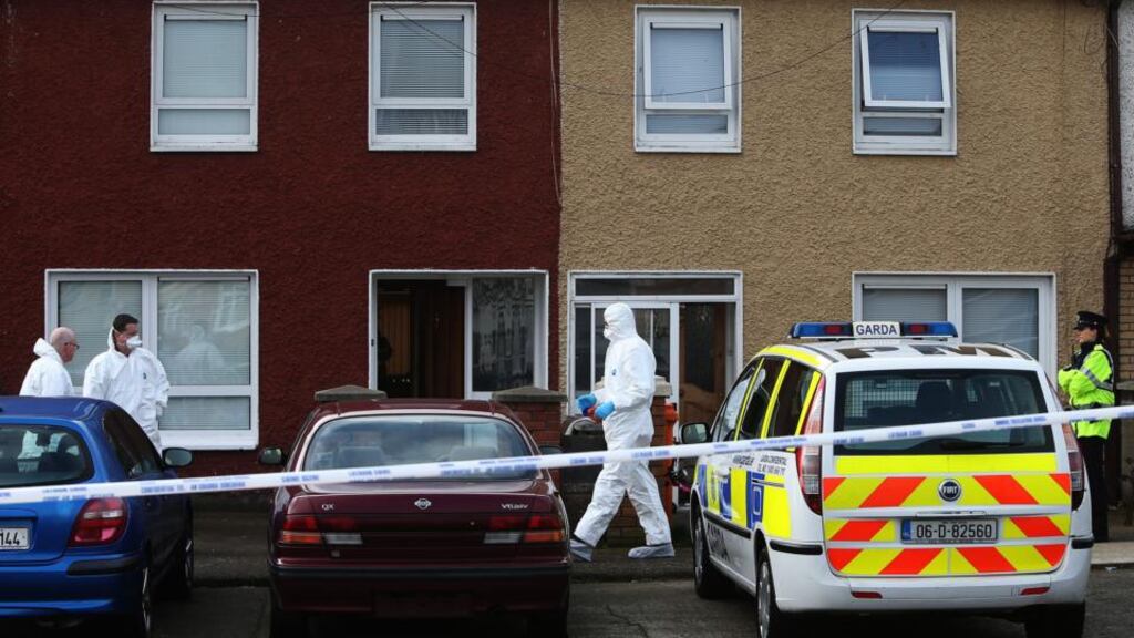 Gardaí are pictured at the scene of a shooting at Killinarden Estate in Tallaght on Saturday. Mary Dargan (66) was fatally wounded during the incident and her daughter Karina was wounded. Photograph: Brian Lawless/PA Wire.