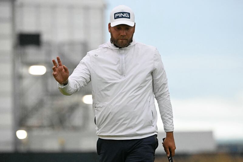 England's Daniel Brown reacts to making a birdie putt on the 16th green during the first round of the Open at Royal Troon. Photograph: Andy Buchanan/AFP via Getty Images