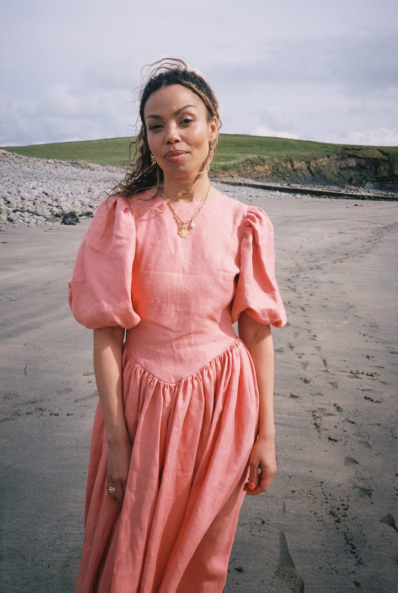 Coral linen dress with bell sleeves €420