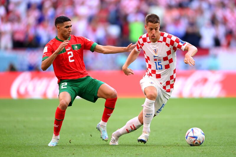 Mario Pasalic of Croatia controls the ball against Achraf Hakimi of Morocco. Photograph: Laurence Griffiths/Getty