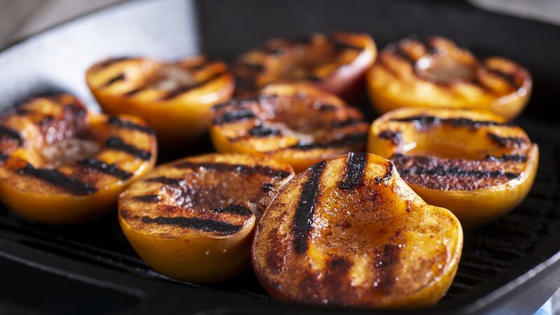 Pork with grilled peaches and a sauce made with the pan juices is ‘the ultimate’. Photograph: iStock