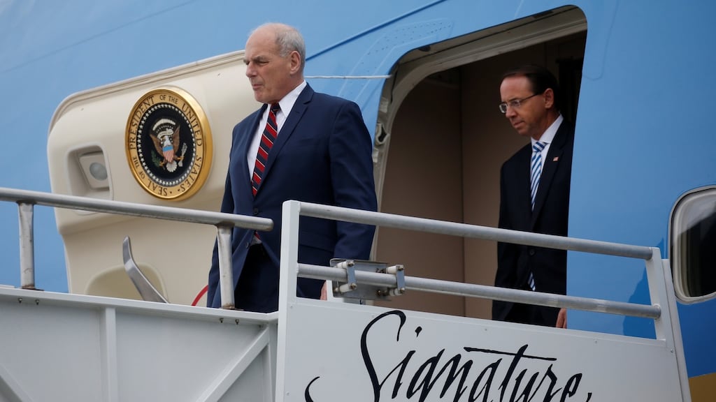 US deputy attorney general Rod Rosenstein follows White House chief of staff John Kelly out of “Air Force One” as they arrive with President Donald Trump in Orlando. Photograph: Leah Millis/Reuters