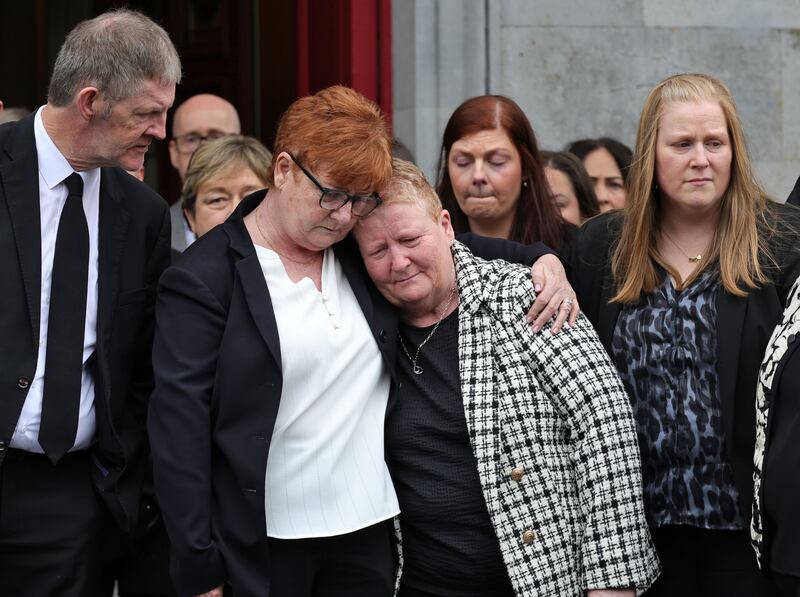Family members console each other after Michael O'Brien's requiem Mass in St Mary's Church, Irishtown, Clonmel, Co Tipperary. Photograph: Colin Keegan/Collins Dublin
