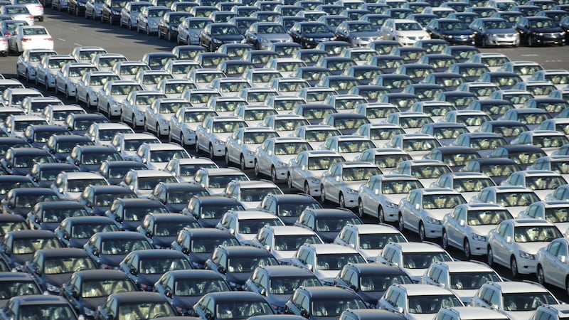 Japanese cars ready for export stand in line at Yokohama port, near Tokyo. Photograph: Everett Kennedy/EPA