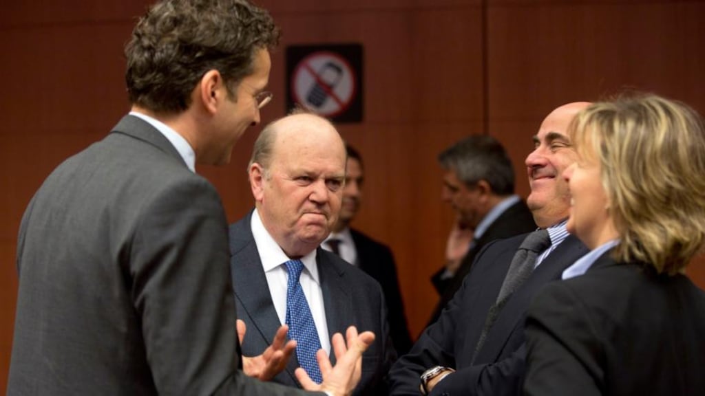 Dutch minister for finance Jeroen Dijsselbloem gestures while speaking with Minister for Finance Michael Noonan, Spanish economy minister Luis de Guindos and Portuguese minister for finance Maria Luis Albuquerque in Brussels yesterday. Photograph: AP/Virginia Mayo