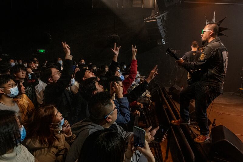 Revellers at a gig in Wuhan. Photograph: Gilles Sabrie/The New York Times