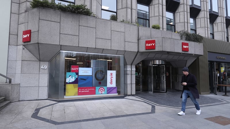 A man passing Davy stockbrokers in Dublin earlier this year. Photograph: Niall Carson/PA Wire