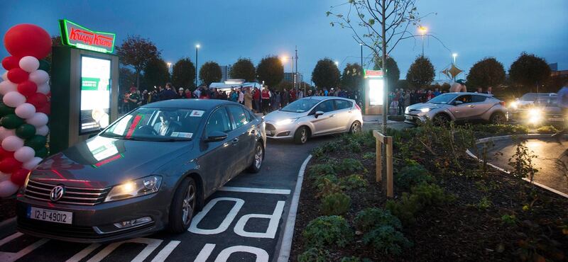 Krispy Kreme: cars queue for the Blanchardstown doughnut store’s drive-through service. Photograph: Leon Farrell/Photocall