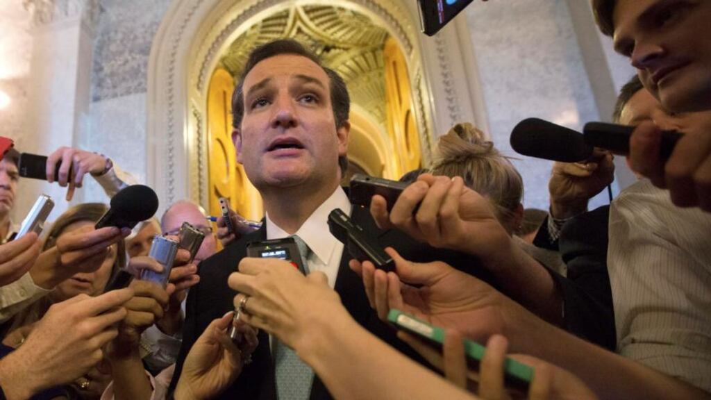 U.S. Senator Ted Cruz (R-TX) speaks to the press after leaving the Senate Chamber after a marathon attack on “Obamacare,” at the US Capitol in Washington. Photograph: Reuters
