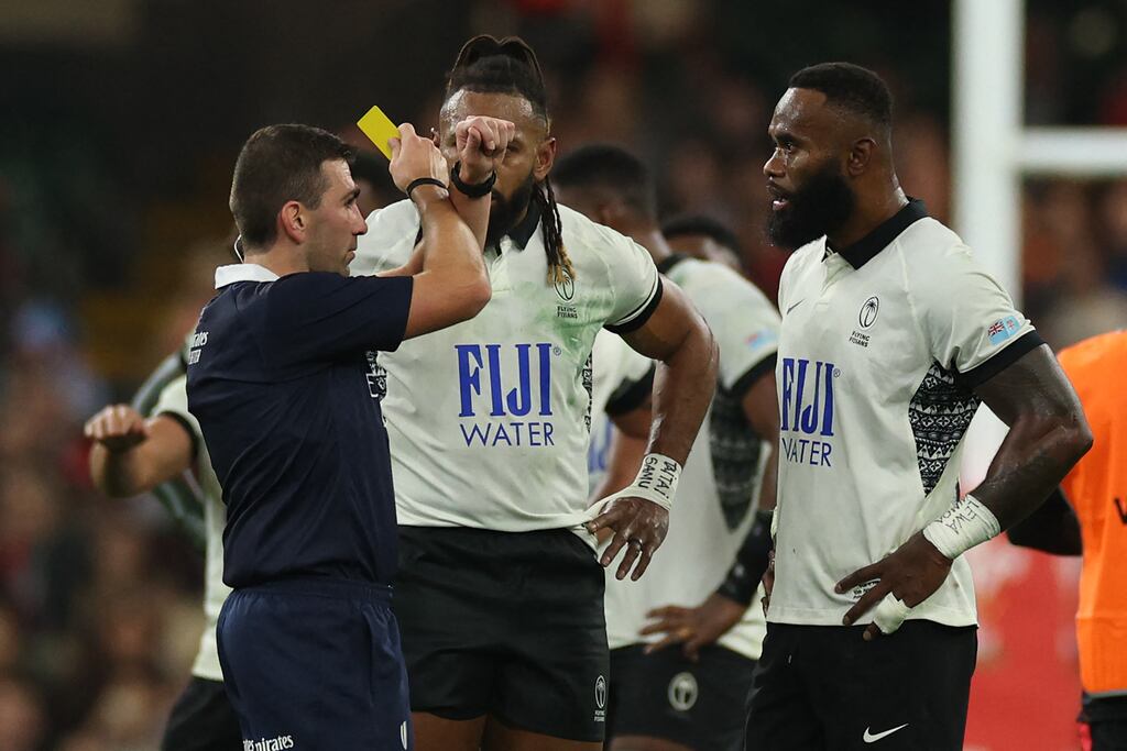 French referee Luc Ramos shows a yellow card to Fiji's wing Semi Radradra during the Autumn Series game against Wales. Photograph: Adrian Dennis / AFP via Getty Images