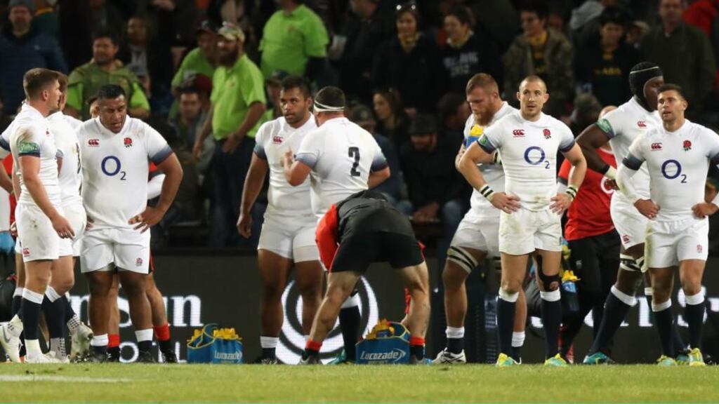 England’s players look dejected after their defeat during the second Test match against South Africa at Toyota Stadium in Bloemfontein. Photograph: David Rogers/Getty Images
