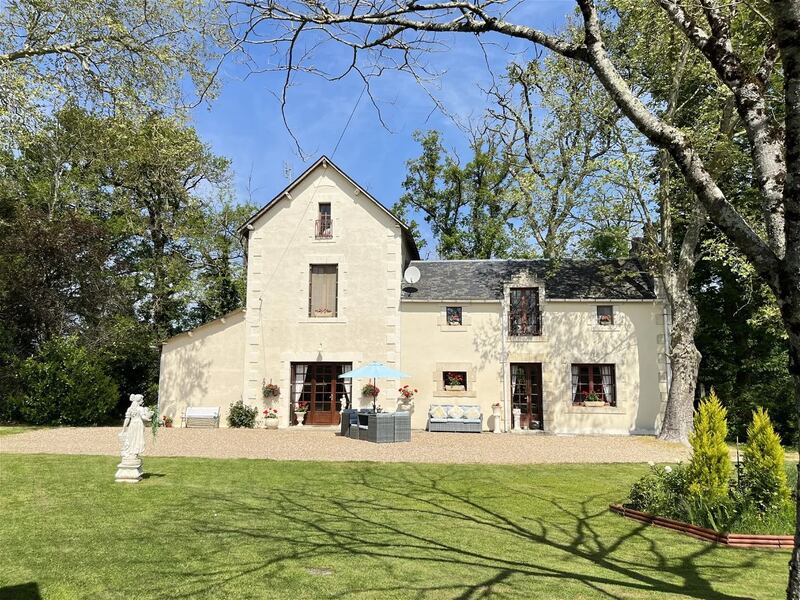 La Trimouille: this charming stone house has a gated entrance and walled gardens in addition to a dovecote in the gardens.