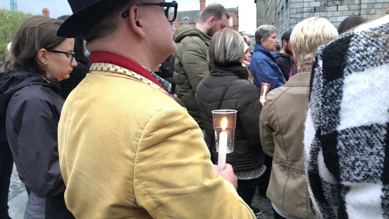 The candlelit vigil was attended by family, friends, work colleagues and students of the missing man.