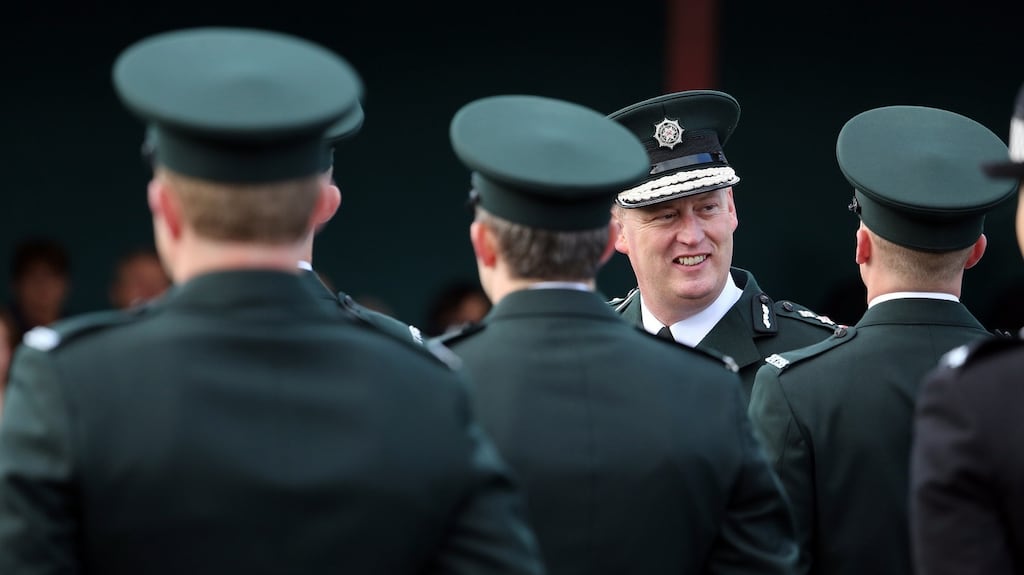 PSNI chief constable George Hamilton during the graduation ceremony of new police officers. Dr Jonny Byrne, a criminologist at Ulster University, says the PSNI is now ‘the visible symbolism of the new Northern Ireland’ and ‘one of the biggest successes of the peace process’. Photograph: Paul Faith/PA