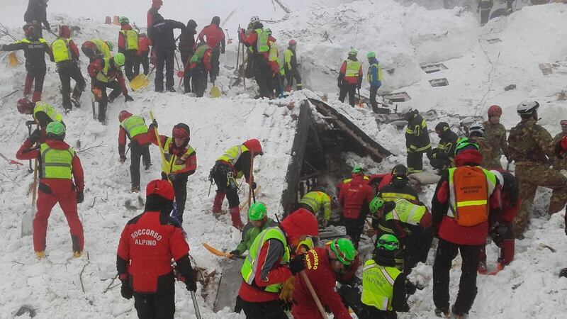 Rescue teams working at the avalanche-hit Hotel Rigopiano, near the village of Farindola, on the eastern lower slopes of the Gran Sasso mountain. Italian rescuers pulled nine survivors from the hotel. Photograph: CNAS/AFP