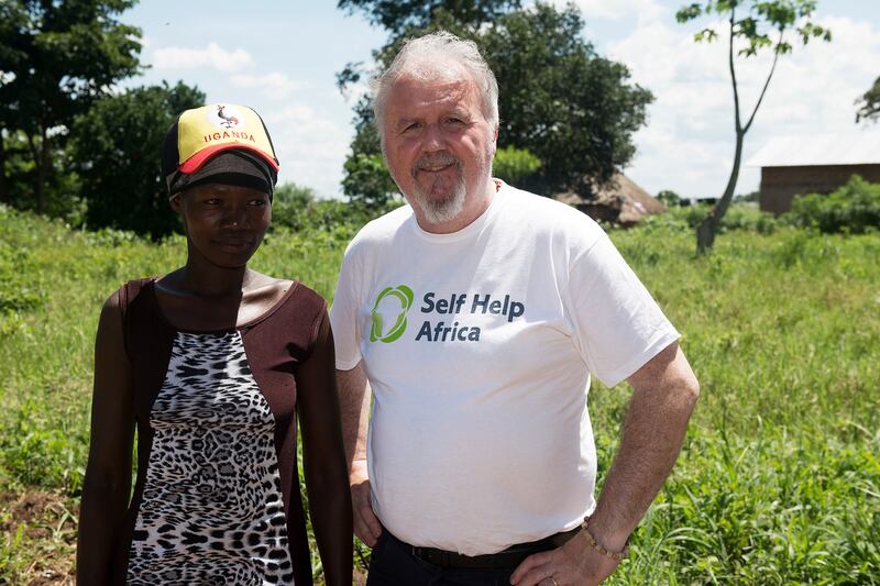 Ronan Scully with farmer Grace Kituma in Kayunga, East Uganda. Photograph: Andrew Downes