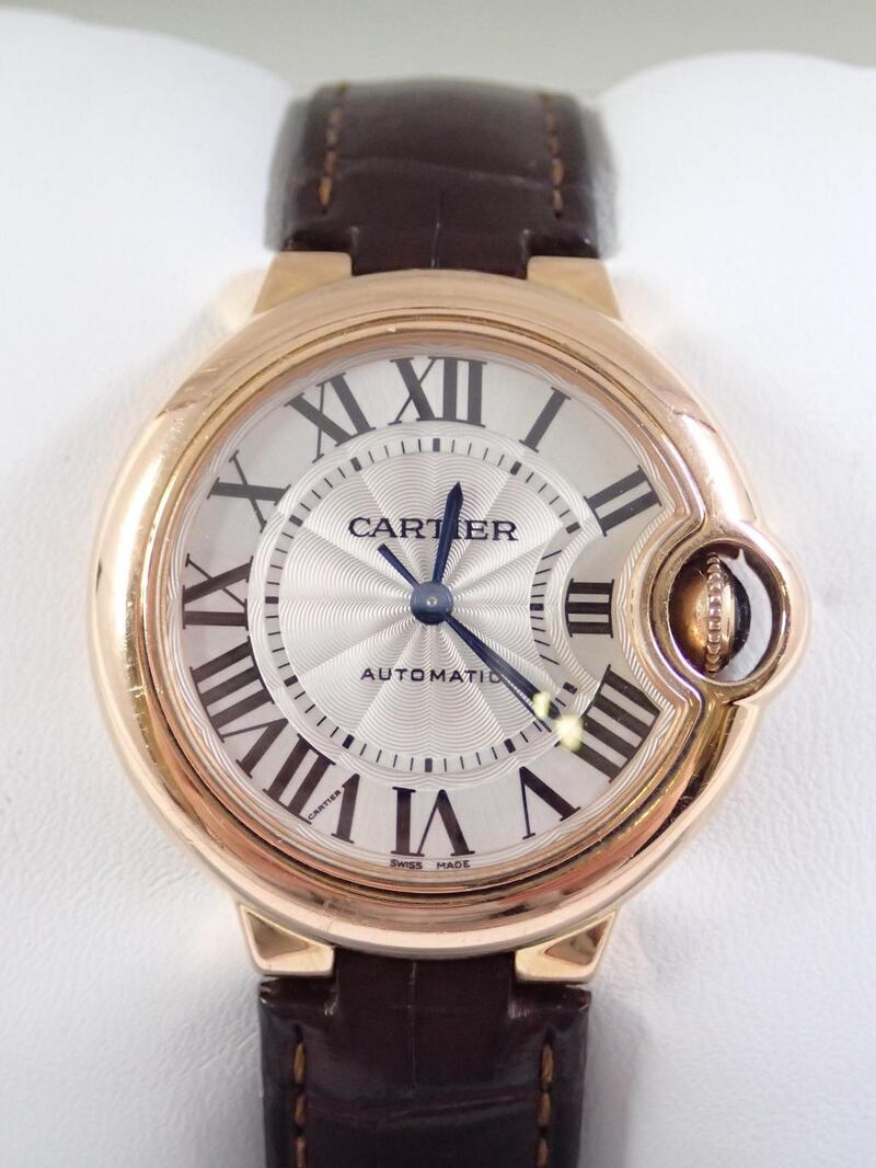 18ct gold Ballon Bleu De Cartier watch, €6,500, John Weldon