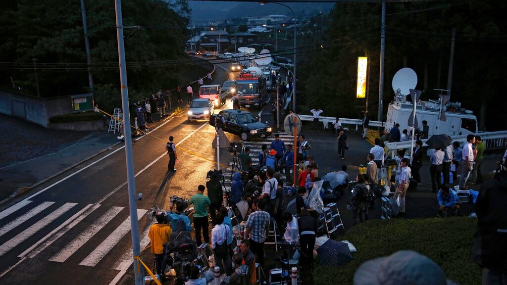 Journalists crowd in front of a residential care facility for disabled people in Sagamihara, near Tokyo, where a man stabbed residents on Tuesday morning, killing at least 19. Photograph: Kimimasa Mayama/EPA