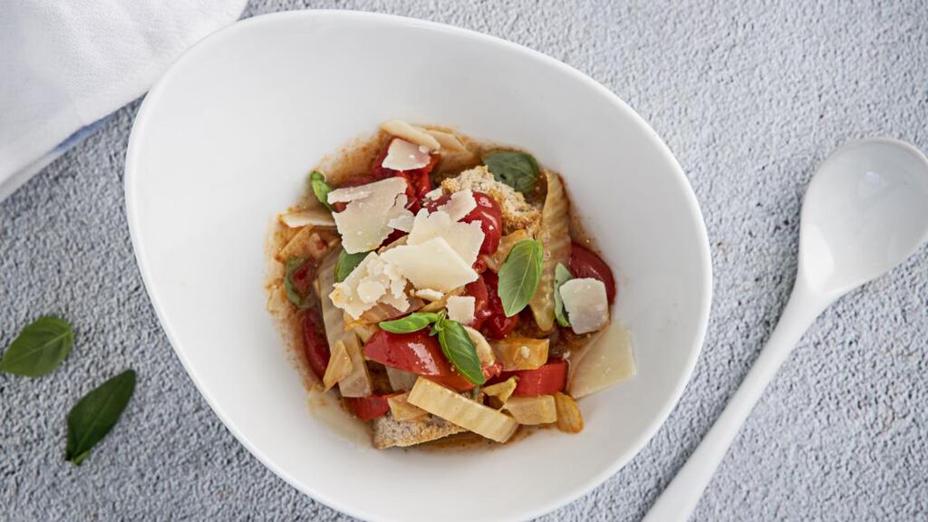 Tomato broth with roasted bread and Parmesan