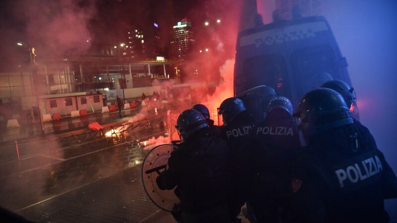 Clashes in Milan, Italy on Monday between demonstrators and police during the protest against the measures implemented to stop the spread of the Covid-19 pandemic. Photograph: Matteo Corner/EPA