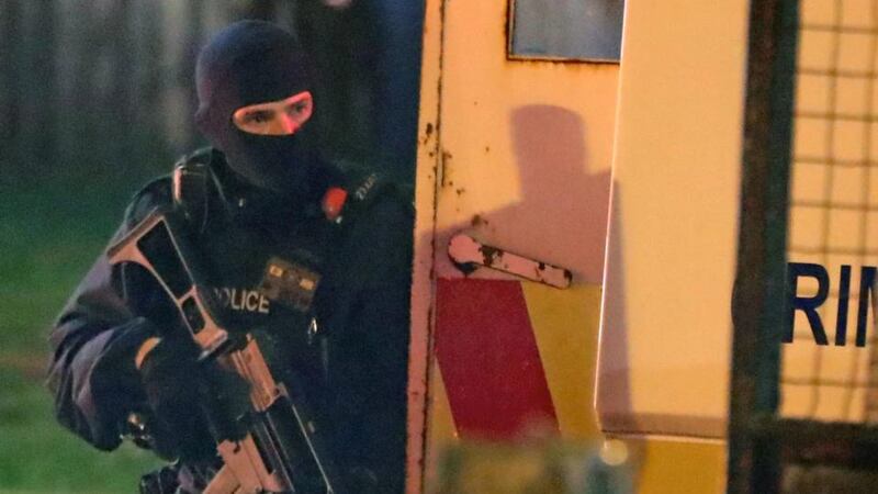 Armed police at the scene of unrest in Creggan, Derry, on Thursday. Photograph: Niall Carson/PA Wire