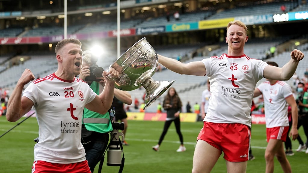 Tyrone’s Niall Kelly celebrates after the game with Hugh Patrick McGeary after they beat Mayo to win the All-Ireland. Photo: Laszlo Geczo/Inpho