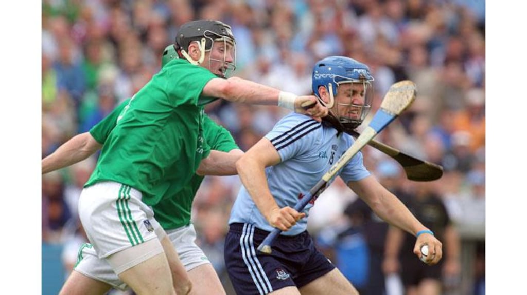 Limerick's Wayne McNamara and Paul Ryan of Dublin in action during the SHC quarter-final at Semple Stadium. Photograph: Cathal Noonan/Inpho
