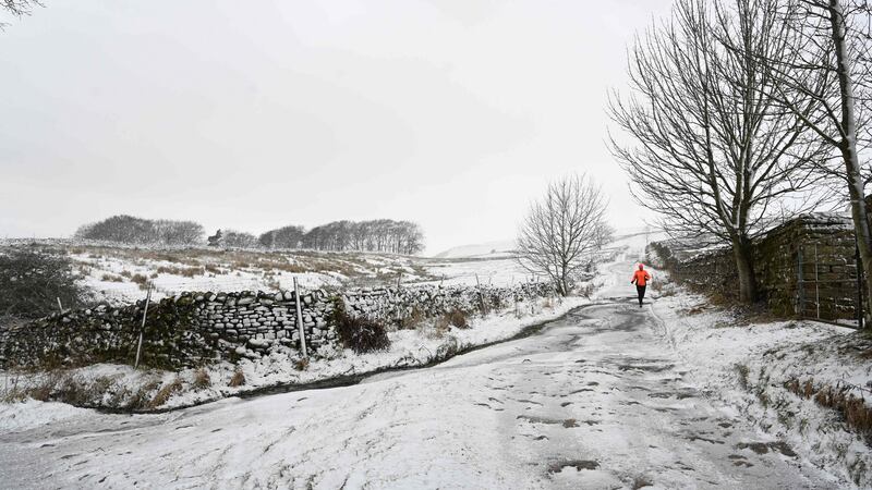 A runner in Askrigg, northern England, on Sunday. Photograph: Paul Ellis/AFP via Getty