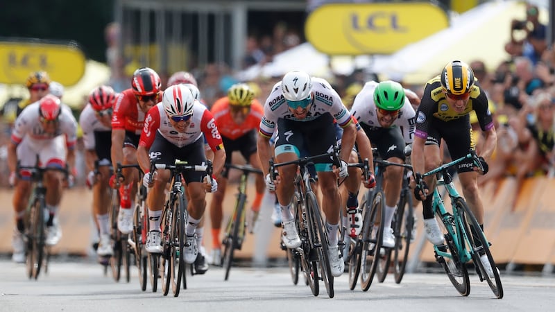Mike Teunissen (R) takes the opening stage of the Tour de France ahead of Peter Sagan. Photograph: Guillaume Horcajuelo/EPA
