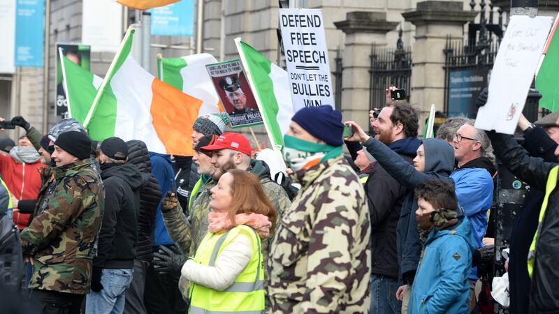 Members of the rally against proposed hate speech legislation outside Leinster House. Photograph: Dara Mac Dónaill / The Irish Times