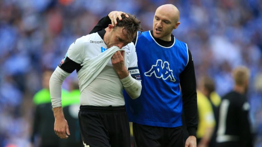 Derby County’s Richard Keogh is consoled by team-mate Conor Sammon after the Sky Bet Championship play-off final at Wembley.