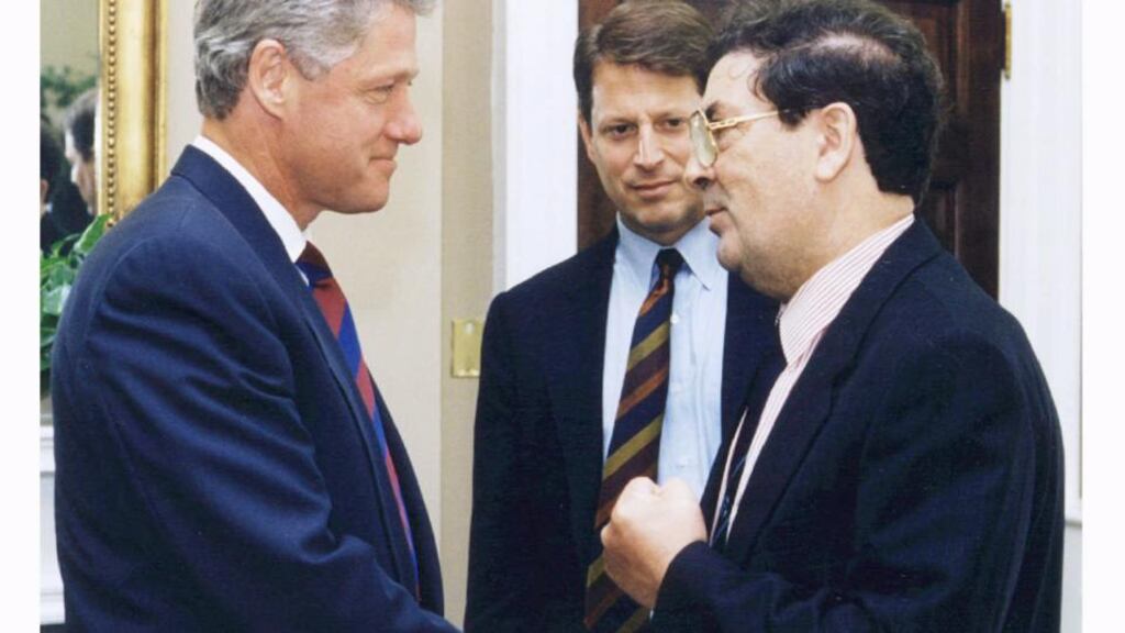 Former US president Bill Clinton and vice president Al Gore meeting SDLP leader John Hume at the White House. Photograph: Reuters