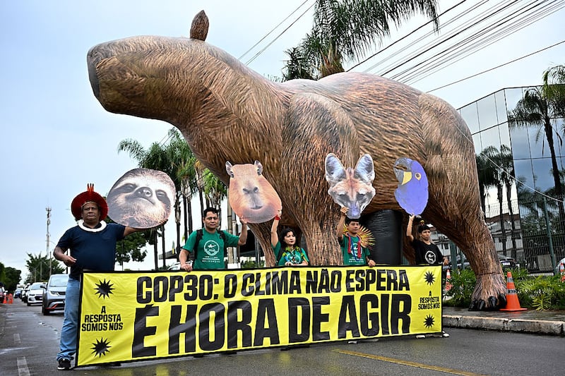 Demonstrators outside the preparatory ministerial meeting ahead of Cop30. Photograph: Ton Molina/Bloomberg via Getty Images