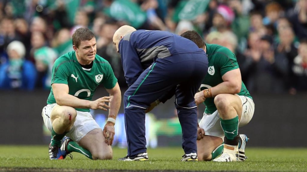 Ireland’s Brian O’Driscoll is treated by Dr Eanna Falvey during the Autumn Series match against New Zealand last month. Photograph: Inpho