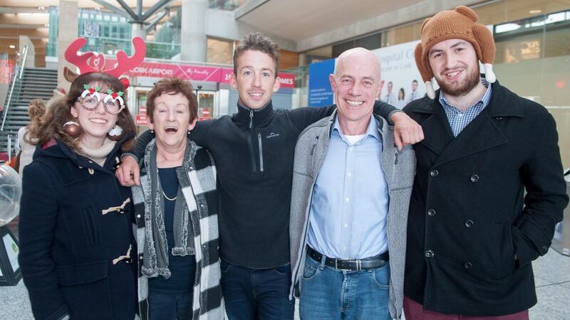Wanfred Waterman (centre) returning from Melbourne for Christmas pictured at Cork Airport with Sister Sally, mum Carmel, dad Wanfred and Adam O'Donovan from Carrigtwohill.Pic. Provision