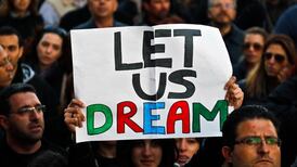 Cyprus agrees deal with troika to levy 20% tax on some bank deposits