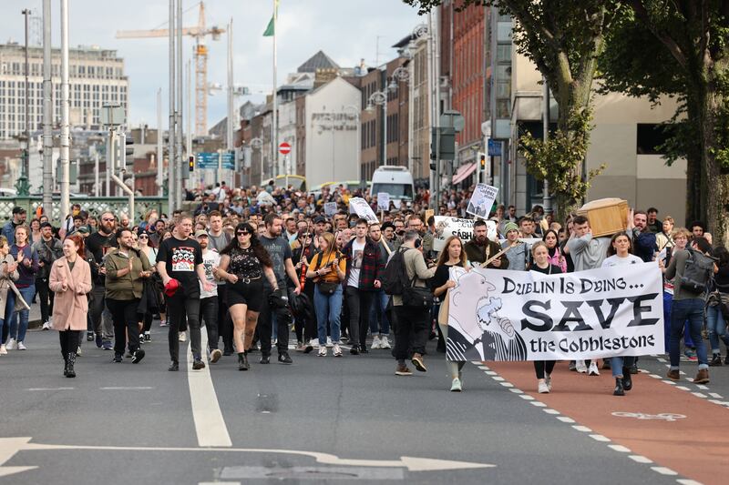 Protesters marching over the proposal to build a 114-room hotel around the Cobblestone pub in Smithfield, Dublin. Photograph: Dara Mac Dónaill