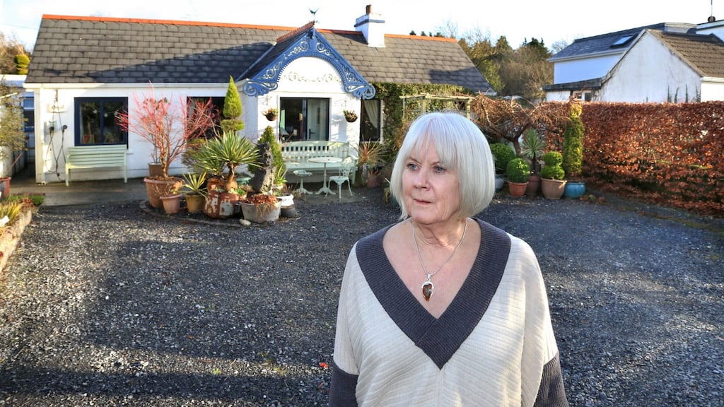 Deirdre Goggin at her home in Ballindooley: she was told in 2015 her house, along with up to 53 others, would fall under compulsory purchase orders to make way for the road. Photograph: Joe O’Shaughnessy